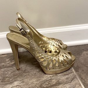 BCBGeneratio platform open toe sling back heels.